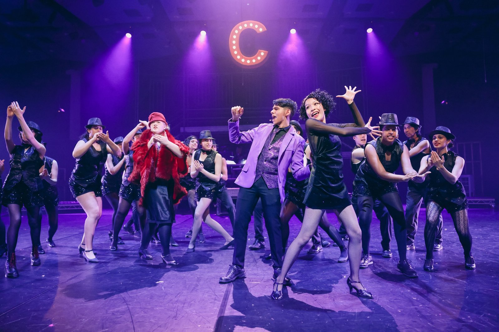 Purple-lit stage performance
